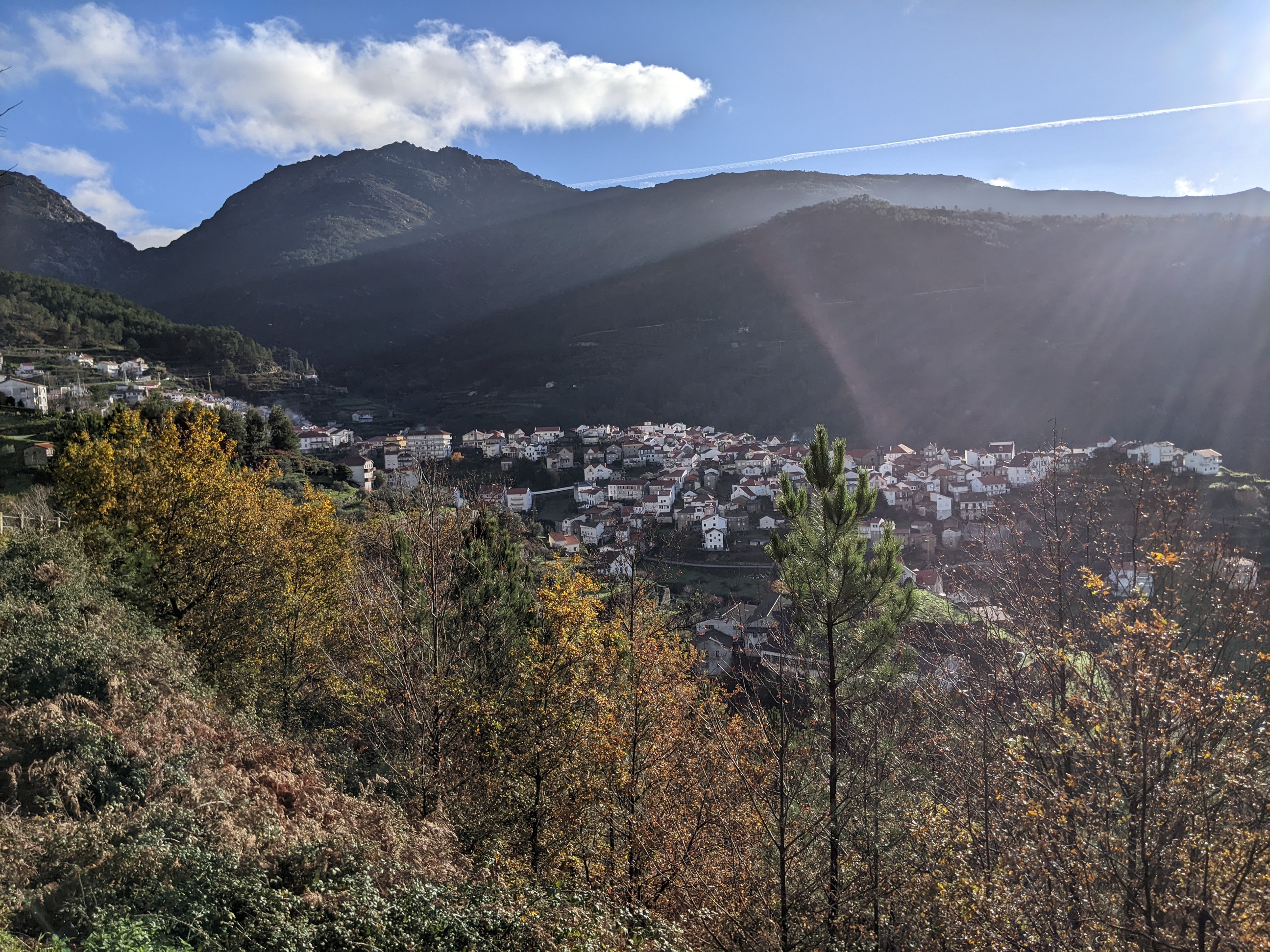 a mountain town shining in the sunlight